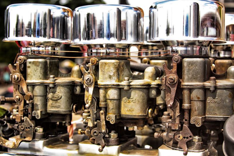 Chrome multi-barrel carburetors on an engine
