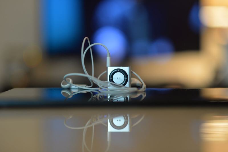 Small digital audio player with earbuds