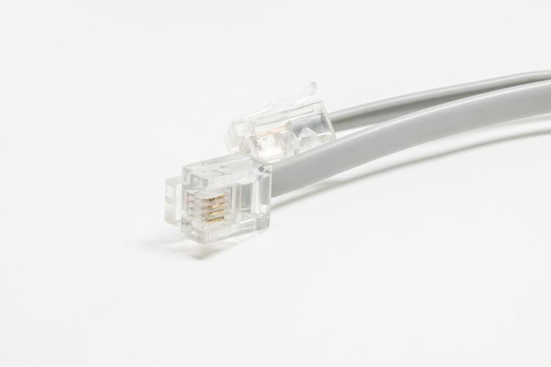 Telephone line cable with a modular plug