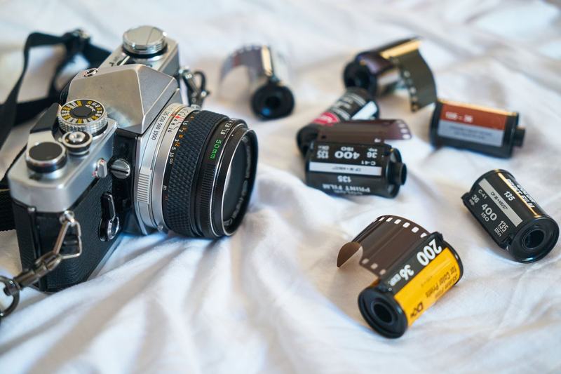 35mm film camera with rolls of film