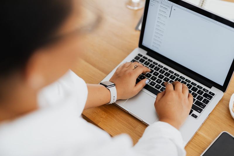 Person reading email on a laptop