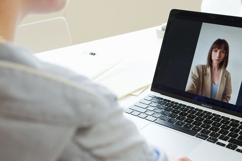 Person on a video call on a laptop