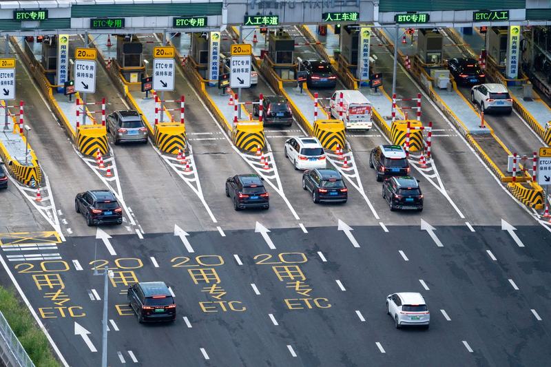 Aerial view of highway lanes at a toll plaza
